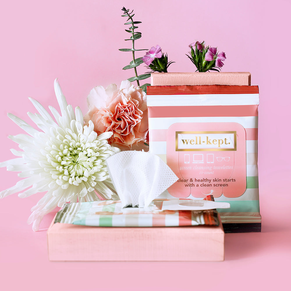 The Better Days- Bundle features tech wipes and screen cleaning towelettes, attractively displayed with floral accents on a pink background.