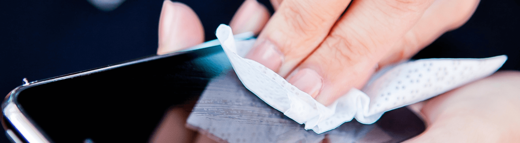 Image of person using Well-Kept wipes on mobile phone.